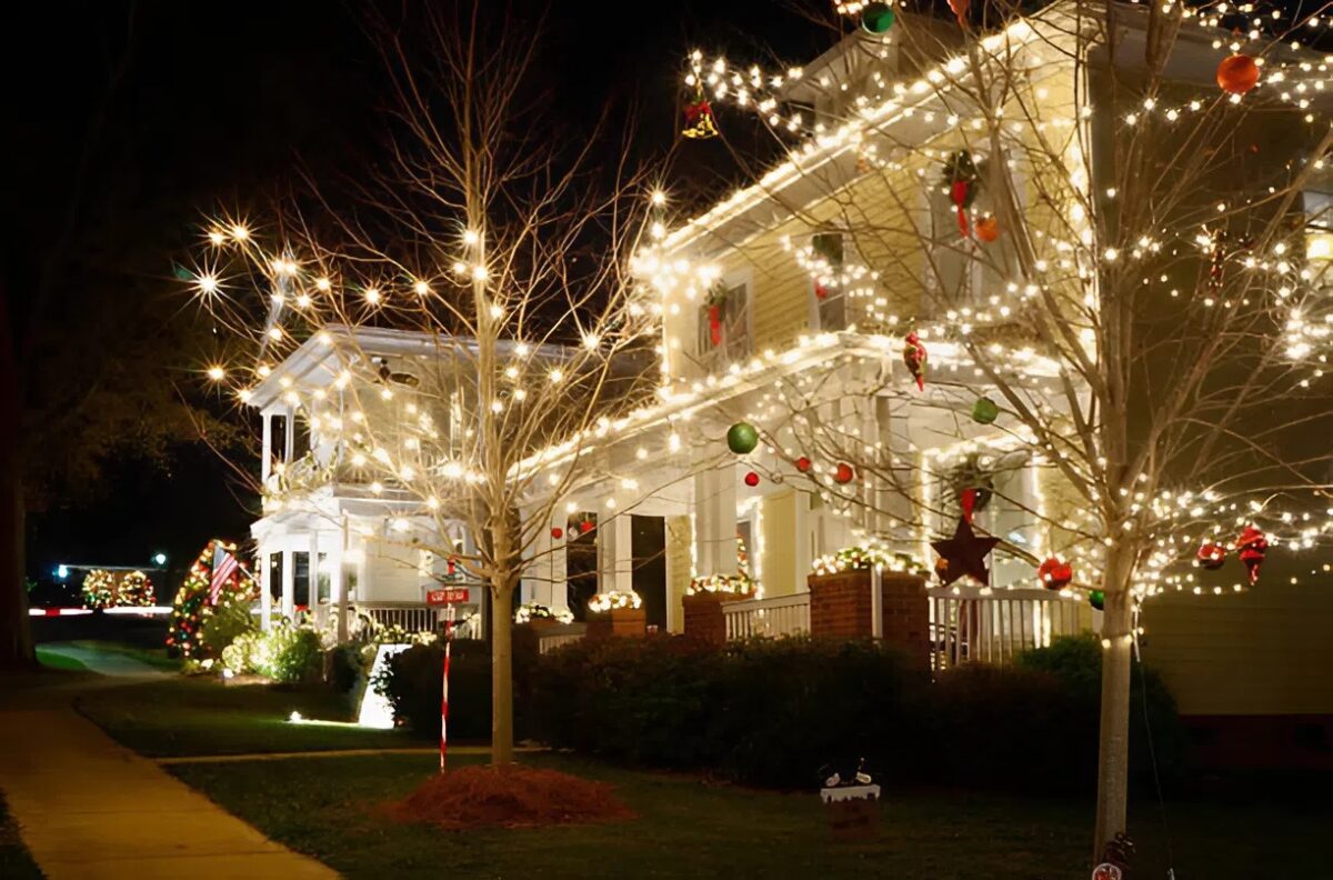 Holiday lighting installed on a home exterior