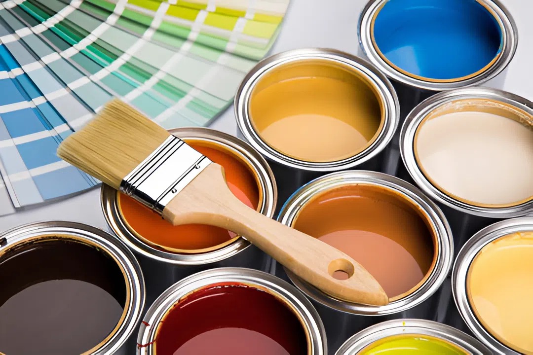 Paint cans and color cards used by a professional painter
