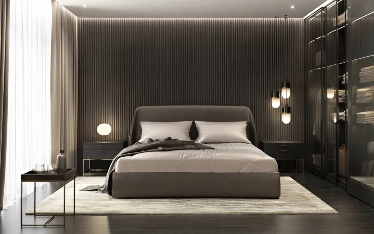 Trendy men’s bedroom with sleek gray interiors