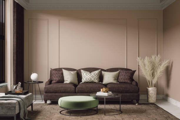 Living room with warm neutral wall color and clean panel detailing by a painting company in Big Lake, MN